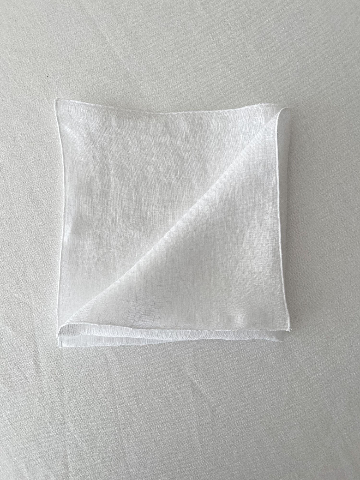 Serviette aus weißem Leinen mit Rollsaum - Linen Notes