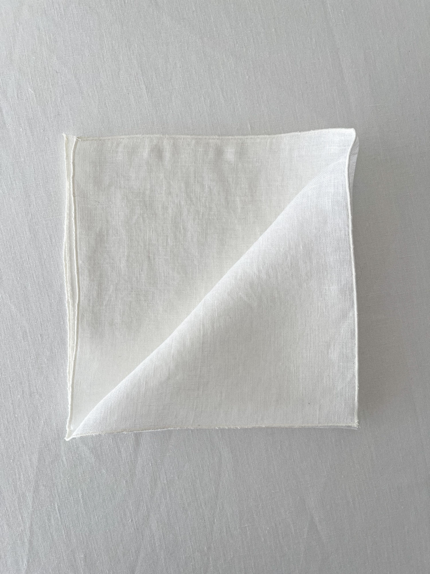 Serviette Leinen gebrochen weiß mit Rollsaum - Linen Notes